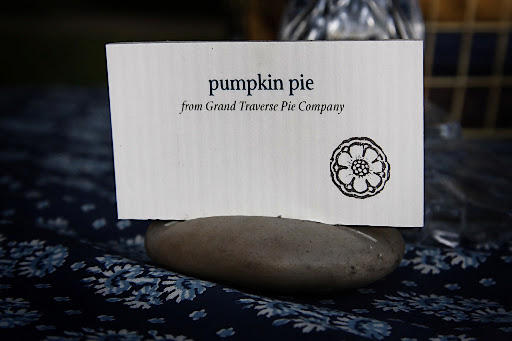 Each pie on the dessert bar had a label propped up in a stone. Each pie on the dessert bar had a label propped up in a stone.