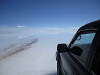 The tracks on the left are dirt which rises up from under the salt.
