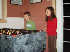 Daniel and Camille play foosball at East 20 pizza.