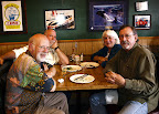 Former President of the Long Beach Century Club Mark Halloran (in olive green long sleeve shirt), sits with other Long Beach Century Club members Former President of the Long Beach Century Club Mark Halloran (in olive green long sleeve shirt), sits with other Long Beach Century Club members