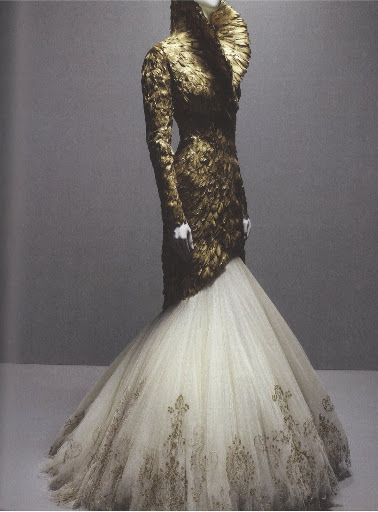 I stared at this dress and jacket for a long time at the exhibit. Made from gilded duck feathers and layers of tulle, it is truly stunning. 