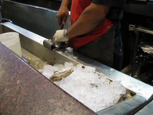Gulf oysters sit under ice until you order, then they start flying fast and furious.