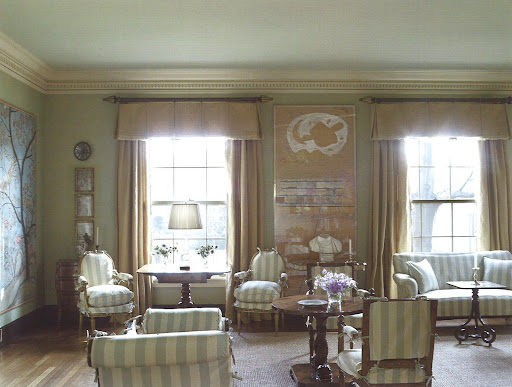 Receiving soft morning light, this welcoming space in Rheinstein's 1914 Georgian-Revival home, is used specifically as a party room. The painting is a Charles Garabedian collage and the bust is from the 18th century. Receiving soft morning light, this welcoming space in Rheinstein's 1914 Georgian-Revival home, is used specifically as a party room. The painting is a Charles Garabedian collage and the bust is from the 18th century.
