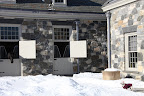 Franny, just look at how much snow is covering the cobblestone courtyard!
