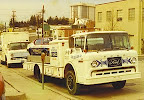Both Transport Trucks In Front of Maryland Hi-Performance Sales