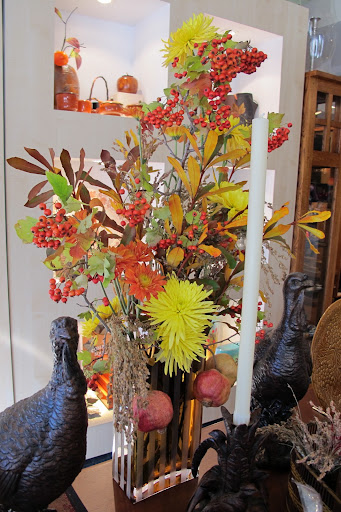The autumn colors in this arrangement are inspiring me.