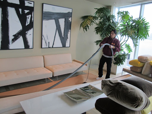 Moving the long vacuum.