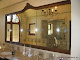 Beveled bath vanity mirror in private residence .