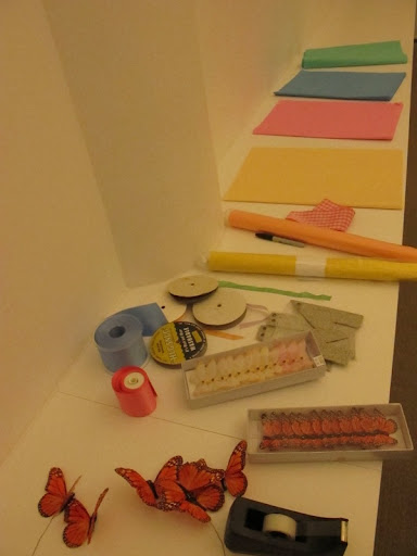 Here are some of my other supplies for the baskets: paper butterflies, ribbon, and tissue paper.