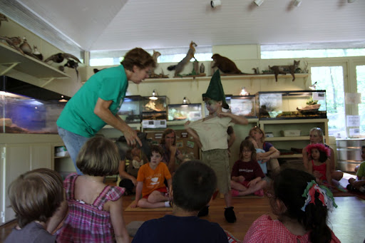 Guests gather round to see some interesting creatures.