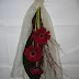 chair end claret gerberas and ivory organza.jpg