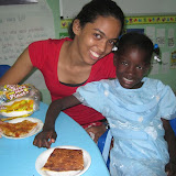 Profe Nicole and Miguelina love their pizza.