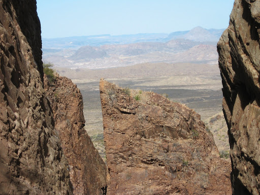 This photo is of a view through The Window of the Chisos Basin into the desert. (photo credit: Philip Stoke)
