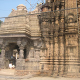 There are small niches with images on base of the tower.