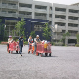 The kids at the local daycare in Minato getting carted out for playtime
