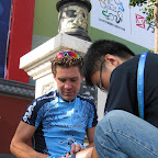 Leon van Bon gets a warm-up massage from Shi Yulong before the start at the Tour of China. (photo: Remko Kramer)