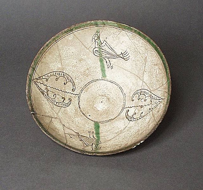 Bowl Iran Bowl, 11th century Ceramic; Vessel, Earthenware, incised, color under transparent glaze, 2 3/4 x 7 in. (6.99 x 17.78 cm) The Nasli M. Heeramaneck Collection, gift of Joan Palevsky (M.73.5.132) Art of the Middle East: Islamic Department.