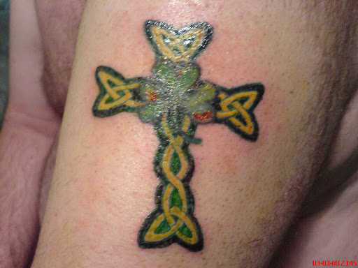cross tattoo arm