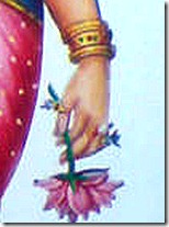 Sita holding lotus flower
