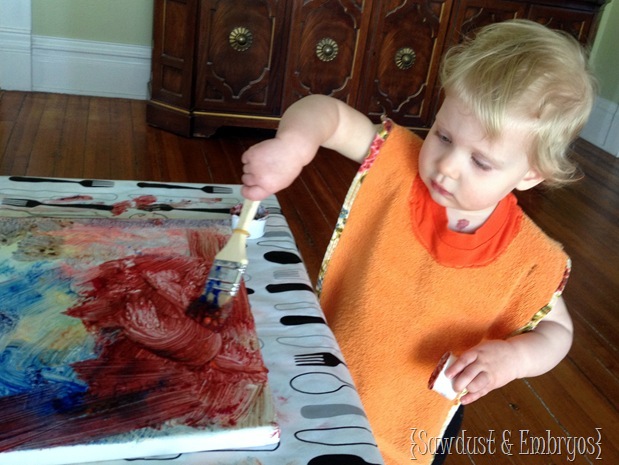 Toddler Finger Paint Artwork {Using Vinyl as a Stencil!}