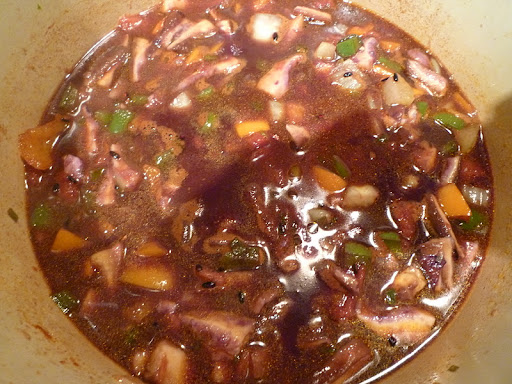 Add broth and tomatoes and simmer away.