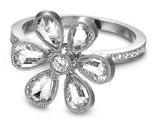 For the romantic in all of us, John Apel's handmade Platinum flower ring is set with beautiful rose-cut diamonds. For the romantic in all of us, John Apel's handmade Platinum flower ring is set with beautiful rose-cut diamonds.