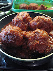 Monty's is a cherished family recipe with ingredients she's not allowed to divulge, but they were large, tender, and meaty, and cooked in a rich tomato sauce. I think Chansie would be proud.