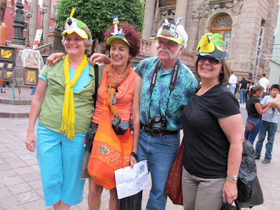 showing off the hats in front of Teatro Juarez
