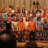 Kai's 3rd grade recorder concert (Kai is in the front row, right next to the microphone stand)