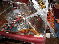 The side of the robot amidst repairs