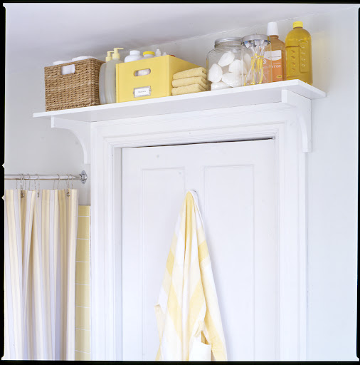 Space above a door or window often goes to waste.  Mount a shelf above it and store extra toiletries in the bathroom or seldom used equipment or supplies in the kitchen.