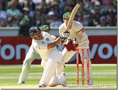 Sachin Tendulkar of India in action with Michael Clarke (L) and Brad Haddin (R) of Australia looking on during day two of the First Test match between Australia and India at Melbourne