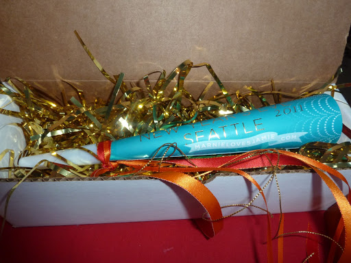 The save the date cone came packed in a box with mylar shred.