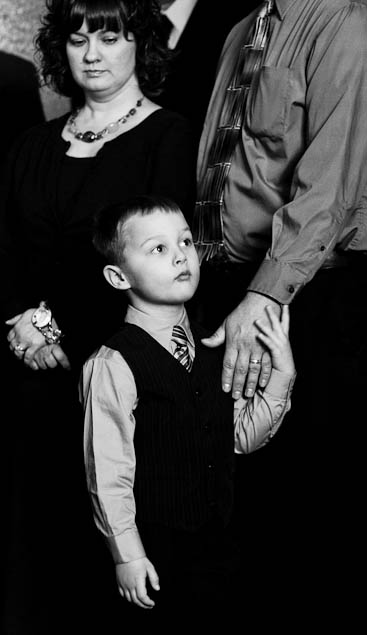 Identity theft victim Carter Andrushko, center, with his parents Jennifer and Matthew, at a press conference where Utah Attorney General Mark Shurtleff and credit reporting company TransUnion announced a new program to protect children from identity thieves Tuesday, January 31, 2012 in Salt Lake City, Utah.