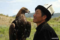 Older Kyrgyz woman with her granddaughter in Karakol
