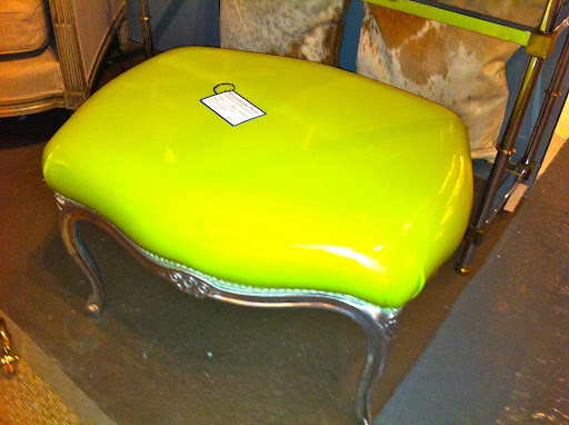 The combination of the bright patent material with the vintage frame of this stool is great.