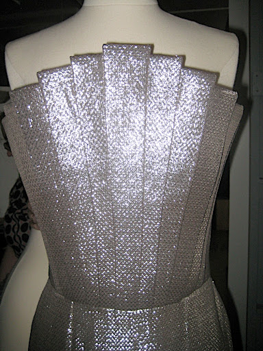 We all loved this dress, and it reminded us a bit of the Chrysler building. The dress is Rafael Cennamo.