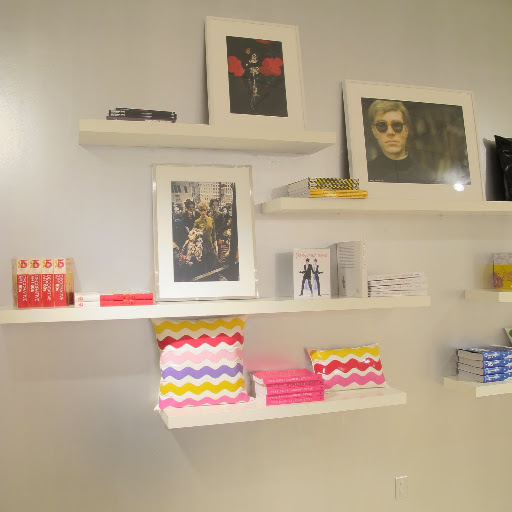The 60s photography is a great touch. Stepping into the store is like stepping back in time.