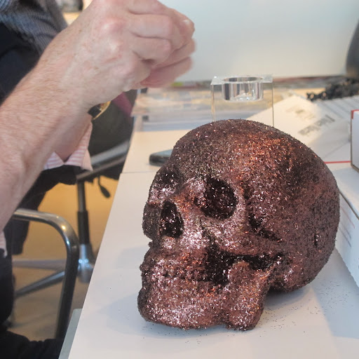 I just crammed the wax into the top of that pillar and let the skull sink into it on top. Easy assemblage and easy clean up afterward!