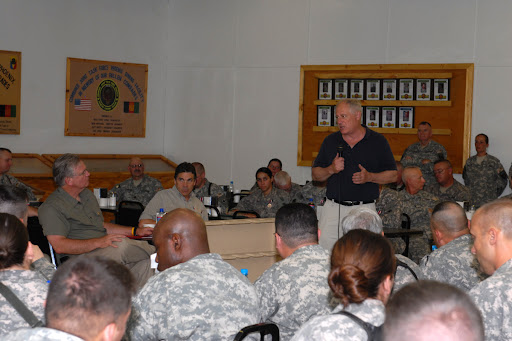Gov. Jay Nixon (left) and Gov. Rick Perry, of Texas (center) listen as Gov. Patrick Quinn, of Illinois (right), expresses his appreciation to soldiers of Task Force Phoenix in Afghanistan on July 20. (photo courtesy: U.S. Department of Defense)