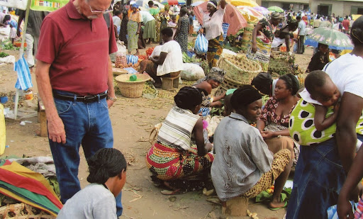 Foley takes a few moments to stroll through the busy marketplace in rural Uganda. (Photo provided by Gene Foley)