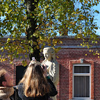 Laughing couple with statue of Mary and child in front of Magdalena church. The baby's head is broken off. They were holding up a picture where the head should be and taking a picture DSC_1254.jpg