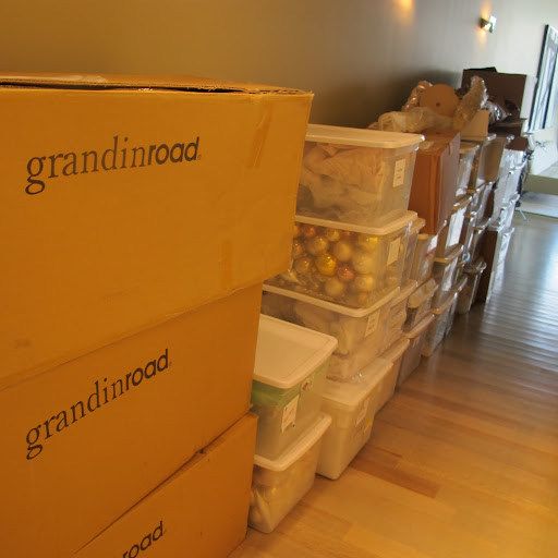 The Grandin Road Christmas trees are stacked.