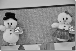 Mr. and Mrs. Snowman brighten up a bulletin board in the Business Office. Mr. and Mrs. Snowman brighten up a bulletin board in the Business Office.