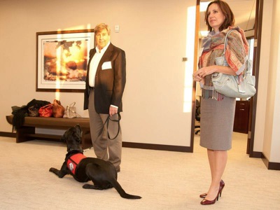 THSD Director of Training Al Kordowski and President Sheri Soltes take Service Dog Intrepid to an open house hosted by a law firm in downtown Austin - roof top!