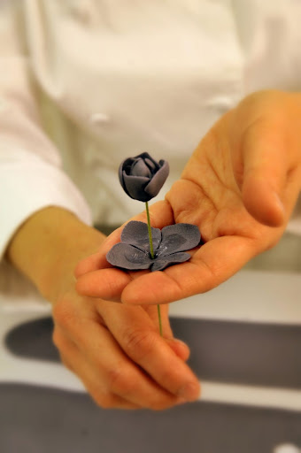 Depending on the size of the flower, Ana will add more or fewer layers of petals.
