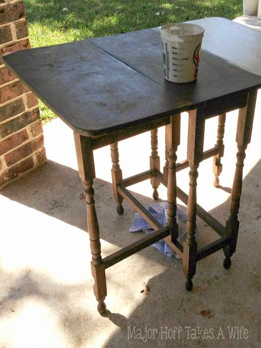 Gate leg table being painted Gate leg table being painted