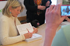 That's right Martha, you sign the books and I'll seal it with a kiss!