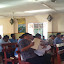 Pastors and church members studying their materials during the lessons
