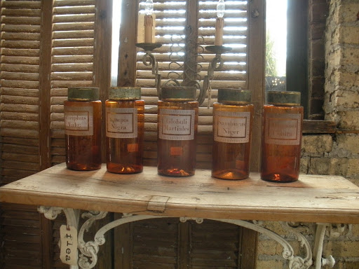 Vintage containers would be unique flower vases or candy jars.